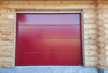 Installation d'une porte de garage sectionnelle aluminium Saulieu par votre installateur Solabaie Rénov'Habitat